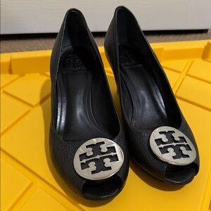 Tory Burch Black Pebbled Leather Peep-Toe Pumps with Silver Logo Medallion